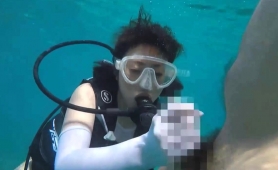 seductive-japanese-beauty-gives-a-nice-handjob-under-water