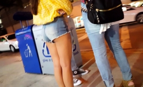 Street Voyeur Finds A Slender Brunette Teen In Tight Shorts