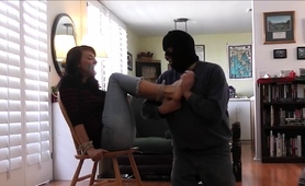 restrained-brunette-milf-getting-her-lovely-feet-tickled
