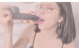 babe-sucks-and-spits-on-a-dildo