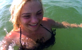 naughty-amateur-blonde-playing-with-her-pussy-at-the-beach