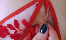 milf-vixen-in-sexy-red-lingerie-plays-with-her-nipples