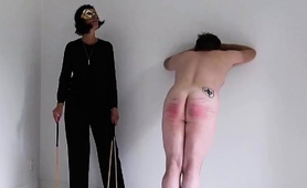 Pitiful slave spanked hard by merciless MILF mistress