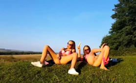 Naughty Young Lesbians Masturbate Together In The Outdoors